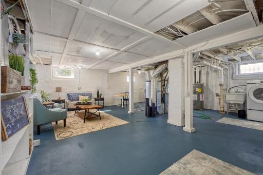 Light & bright lower level has a high ceiling!