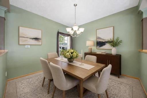 Elegant and inviting, the formal dining room offers a wonderful setting for holiday dinners, celebrations, and memorable gatherings. Shown virtually staged to showcase the space’s potential and help envision your own style.