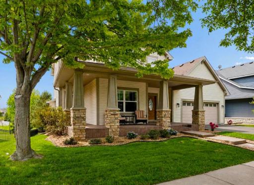Welcome home to a charming wraparound front porch, beautifully landscaped yard, and inviting curb appeal. Set in a beautiful neighborhood, this welcoming exterior offers the perfect spot to relax, greet neighbors, and enjoy the view.