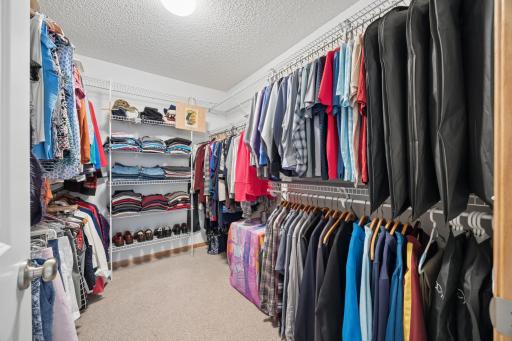 Stay organized with ease in the spacious walk-in closet, conveniently connected to the primary bath. The thoughtful layout provides plenty of room for clothing, shoes, and accessories while keeping your everyday routine beautifully streamlined.
