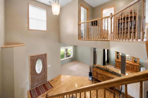 The soaring open foyer brings in great natural light