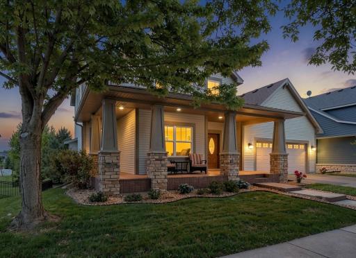 End the day in style on the charming wraparound front porch—a perfect spot for an evening gathering with friends and family, relaxing with a favorite drink, and enjoying the welcoming neighborhood atmosphere.
