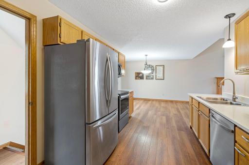 Kitchen with quartz counters and stainless steel appliances