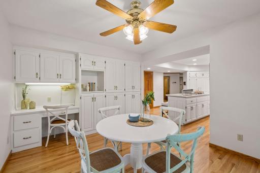 Informal dining area and built in storage and desk space