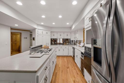 Solid surface countertops, recessed lighting, and enameled cabinetry (2026)