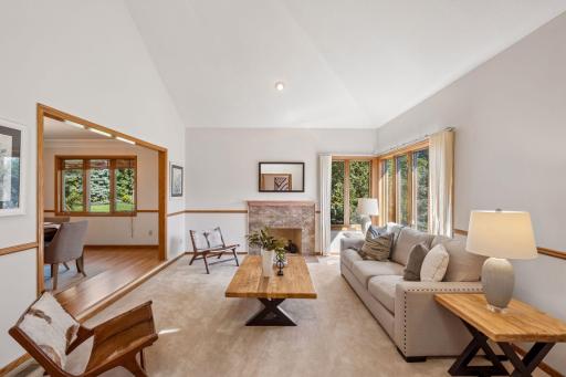 Great natural lighting, fireplace, and easy connection to dining room