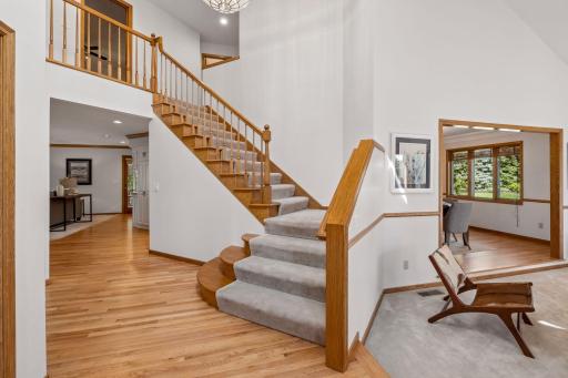 Staircase to upper level - vaulted ceilings