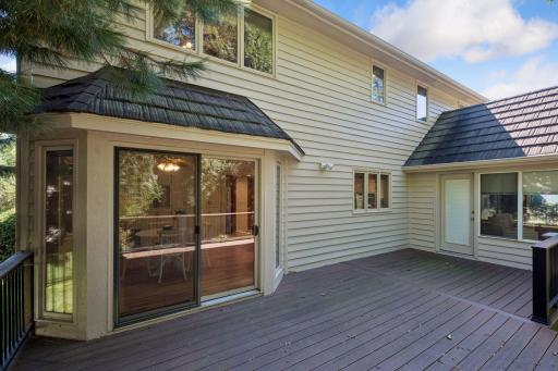 Sliding glass door to informal dining space - door on right is to the sunroom
