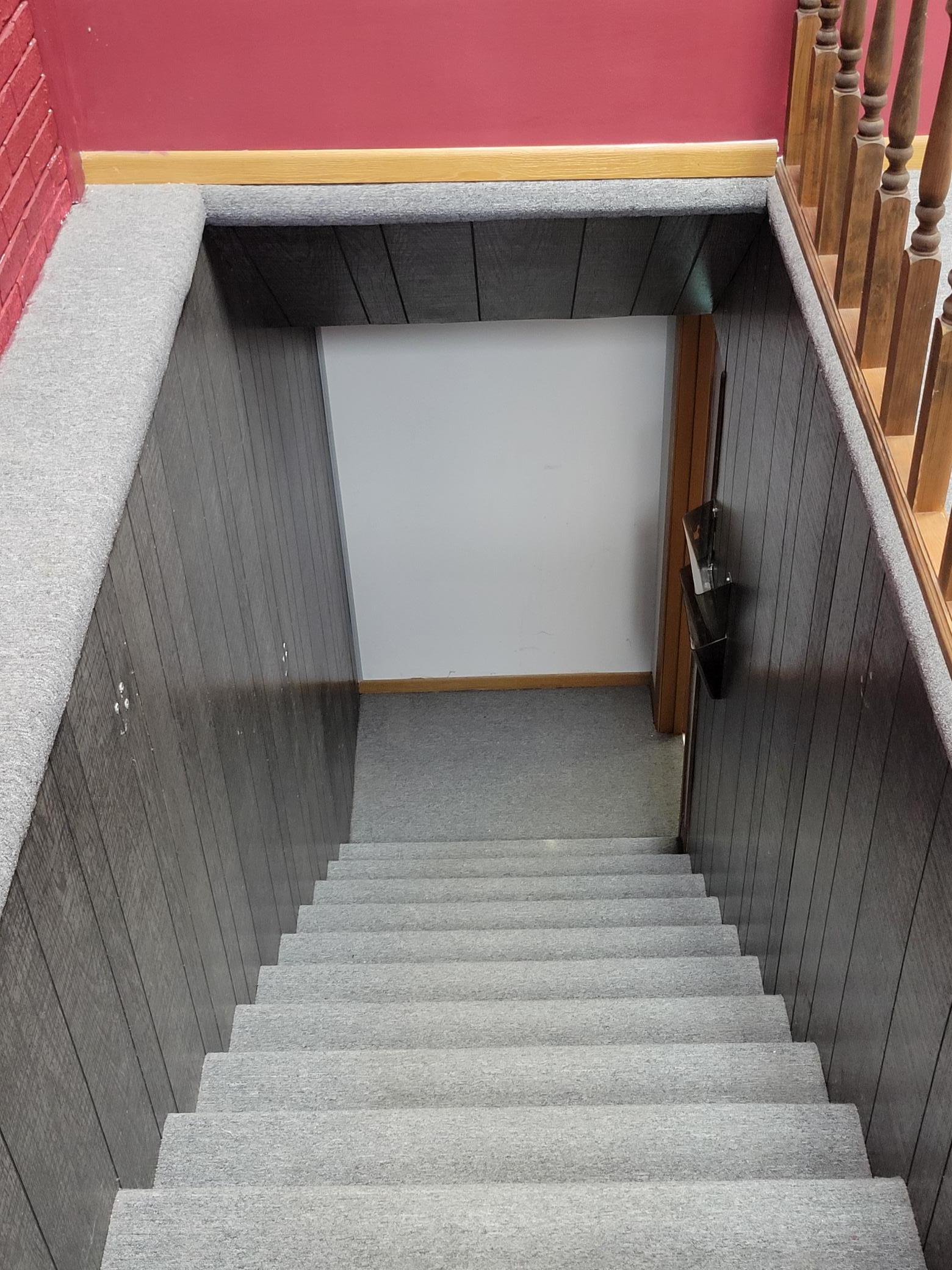 Steps from main floor to lower office area