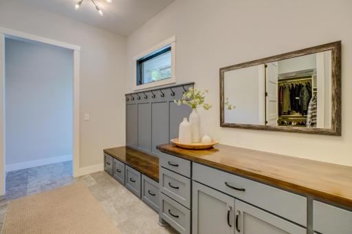 Spacious mudroom provides convenient access to the heated 3.5-stall garage!