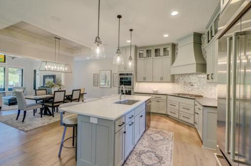 Expansive kitchen offers generous workspace and an open connection to the main living areas!