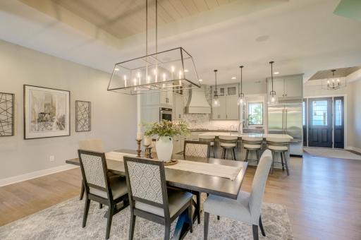 Natural light and serene backyard views create a beautiful setting for everything from casual meals to memorable gatherings!