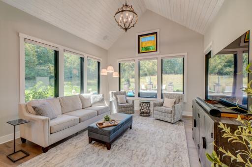 A peaceful four-season retreat with beautiful views of the private wooded setting!