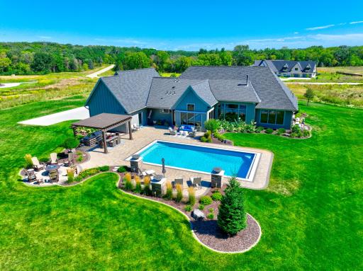 Resort-inspired outdoor spaces make this backyard an entertainerâs dream!
