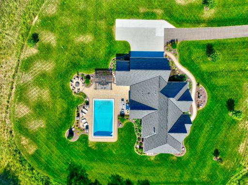 Your private outdoor retreat features a 20' x 37.5' heated chlorine pool with (3') shallow and (6.5") deep ends and an electric cover!
