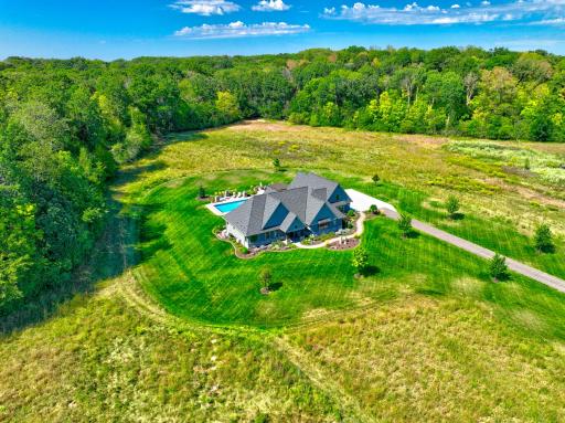 Expansive property surrounded by mature woods and abundant wildlife!