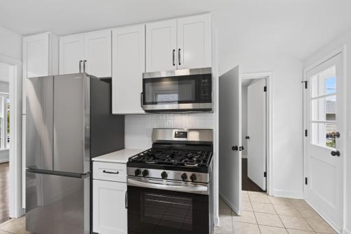 Kitchen to basement and back entrance