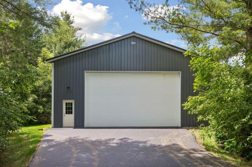 40x60 pole barn with cement floor already has electric, water and heater ready to be finished.