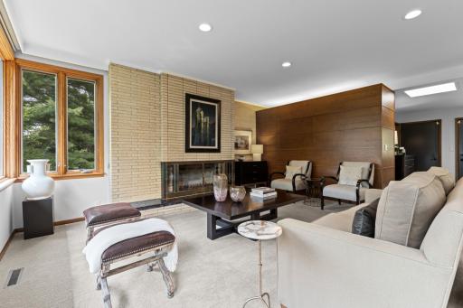 Distinctive brick and copper wood burning fireplace.