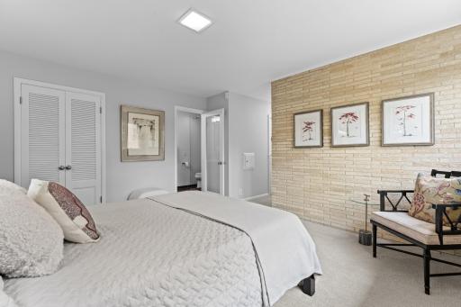 Large windows and skylights bathe the room in natural light.
