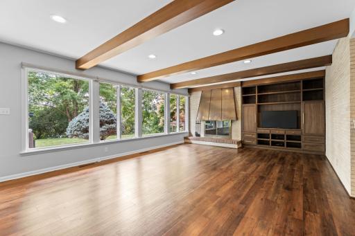 Warm wood tones and thoughtful built ins create an inviting space to relax.