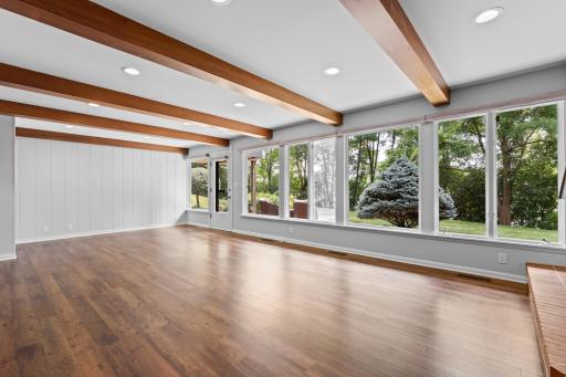 Walk out lower level with commanding beam architecture.