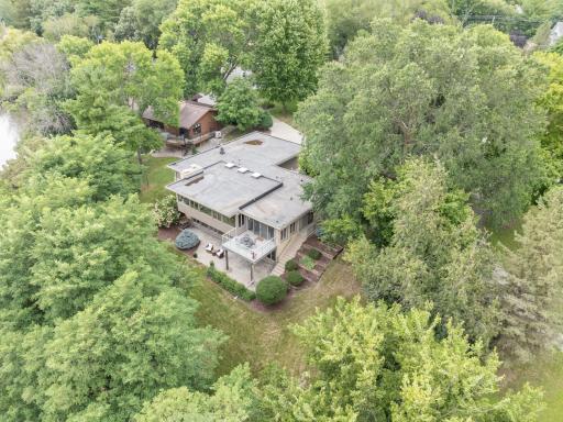 Surrounded by trees, this home is exceedingly private.
