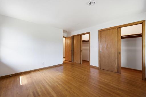Double closets in the main level bedroom.