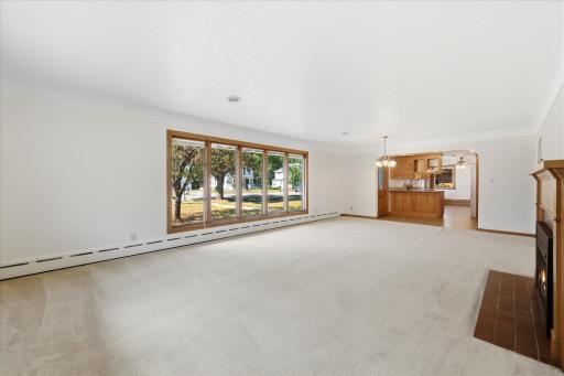 Living room that have large windows that provide a lot of natural light.