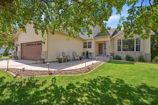 Nice curb appeal front exterior w/brick accents and vinyl siding exterior along with alum soffits/fascia + gutters. Newer garage doors and paver patios front/back