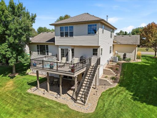 Beautiful landscaping w/paver edging, block retaining walls and lots of perennial plants and shrubs. Numerous landscape lights w/color changing bulbs