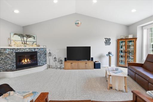 Vaulted Great Rm w/gas fireplace and built-in rear spkrs + ceiling fan/light (remote) + updated carpe
