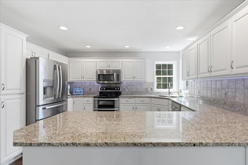 Remodeled Kitchen includes: granite counter tops adn ss appliances including double oven (convection)