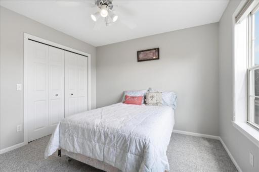 Upper level 2nd of 3 Bedrooms upper level with ceiling/fan light and updated carpet