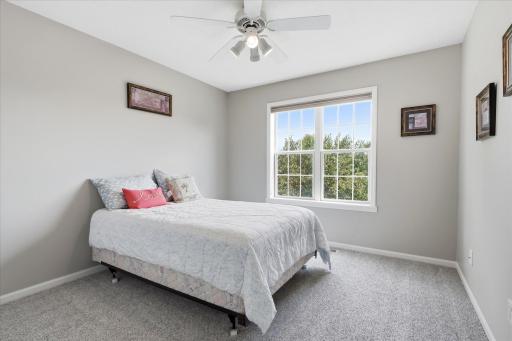Upper level 2nd of 3 Bedrooms upper level with ceiling/fan light and updated carpet