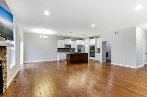 Gorgeous flooring ties each space together, adding warmth and continuity while elevating the home’s overall style.