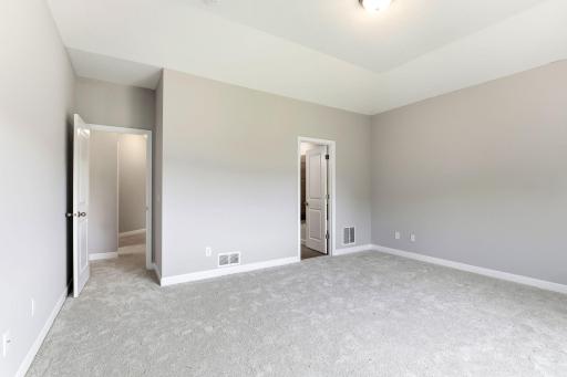 Primary bedroom features private ensuite bathroom