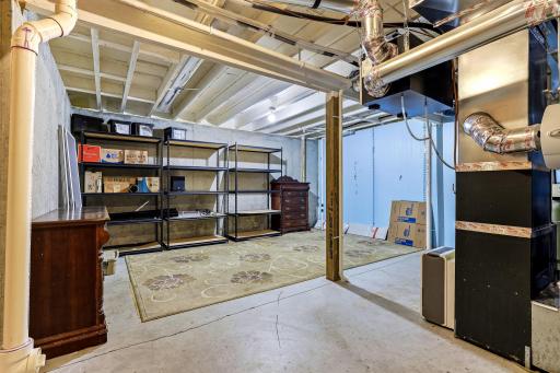 A spacious utility room offering exceptional storage capacity.
