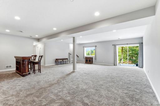 ENORMOUS walk-out lower level family room!!