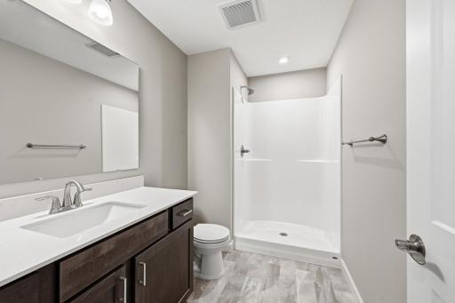 Finished Walkout Basement Hall Bath - The Madison at 937 Kepler Ave NE in Oakview Ridge!