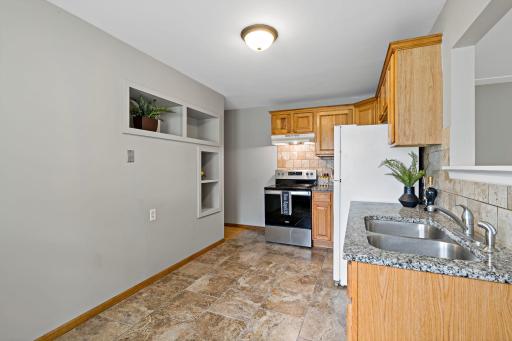 Unit 3810 - There is display shelving or extra storage spaces in Kitchen. There is room for a small breakfast table in kitchen.