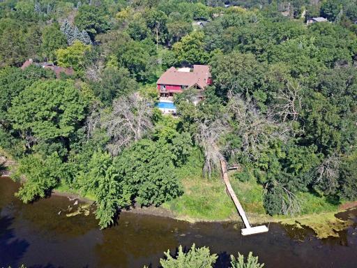 Photo for 14951 Juniper Ridge Drive NW, Ramsey, MN 55303 - listing #7136939 Spectacular nature oasis on over 1 1/2 acres on the Rum River! Bring your poontoon, boat or kayak to immerse yourself in the natural beauty and extensive wildlife!