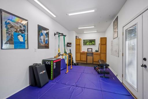 Don't miss the heated bonus room off the garage. It's perfect for an exercise area, workshop, private office space or whatever you need! It is accessible through the garage and has french doors that open to the fenced side yard.