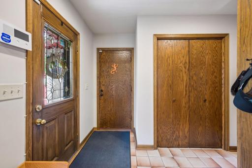 The back entry and garage door both lead directly into the back mudroom area. A large coat closet keeps things tidy.