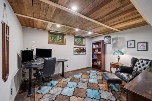 Also on the walkout level is an office/non-conforming bedroom (no egress). This room has solid surface flooring, recessed lights and a full closet for storage.