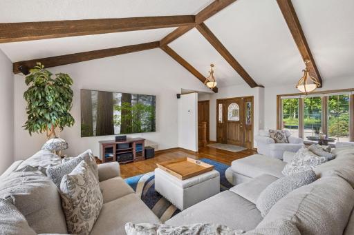 The main living room is large enough for all your guests and has large picture windows on both East and West facing walls for wonderful natural light throughout the day.