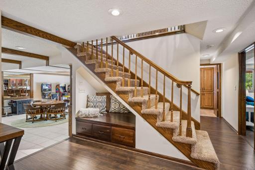 The stairway is open and airy and features a fun 'Harry Potter' style reading nook with additional storage beneath.