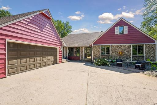 This beautiful custom home is surrounded by mature landscaping and has a newer roof with high quality class 3 architectural shingles. In addition to the oversized 3 car garage, there is plentiful off-street parking on the large concrete driveway.
