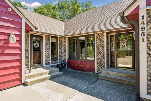 Two entry doors on the front allow access to the living are or directly into the back mudroom area.