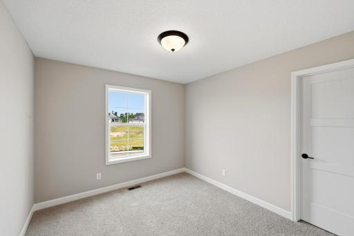Upper Level Bedroom 2 - The Silvercreek at 825 Walnut Grove Lane in Oakview Ridge!